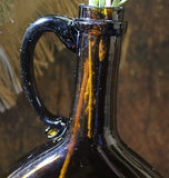Chestnut Blown Amber Bottle c. 1850 - 1860