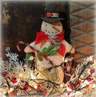 Orchard Basket with Snowman Holding Lantern Greens Lights Up