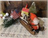 German Santa in Sleigh Full of Toys