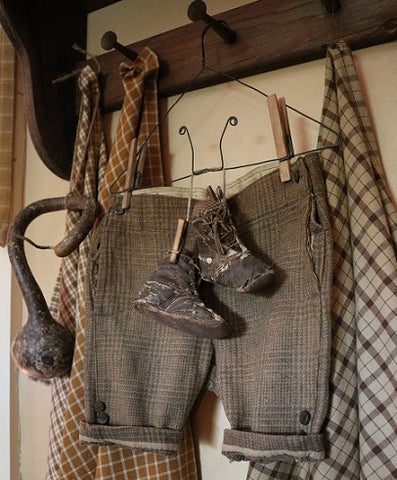 Old Winter Woolen Britches with Leather Baby Shoes Sweet