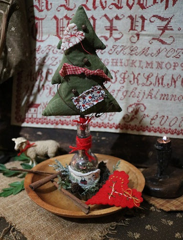 Primitive Tree in Painted Bottle with Bowl Gathering