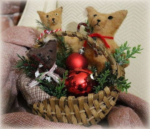 Three festive Artist Bears Snuggled in Holiday Basket